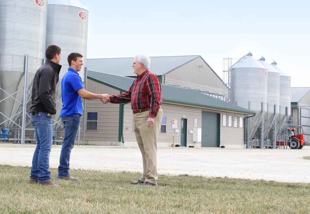 Indiana poultry farmers meet with AgFi lender to discuss beginning farmer and rancher loan options.
